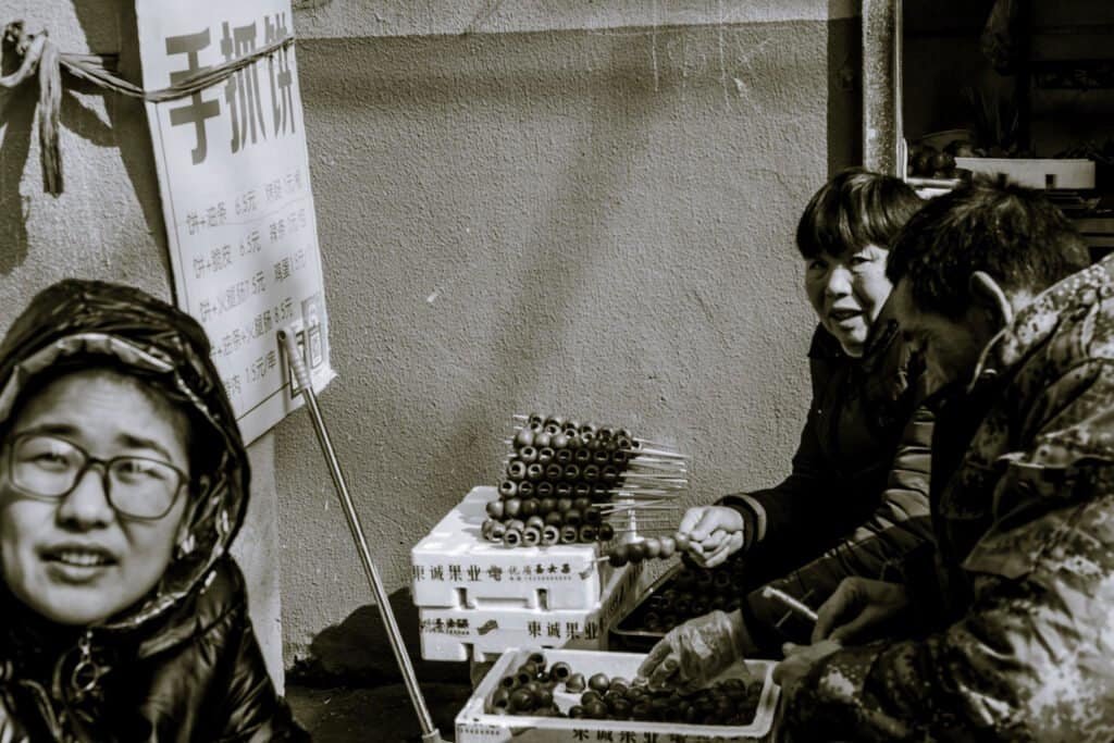 Lianyungang, jiangsu, china, street food, man woman, sitting, street, black and white