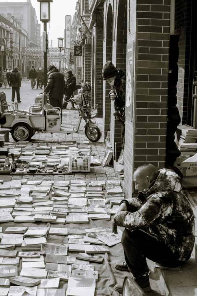 Lianyungang, jiangsu, china, kids, table, man, street, selling, books, sitting,