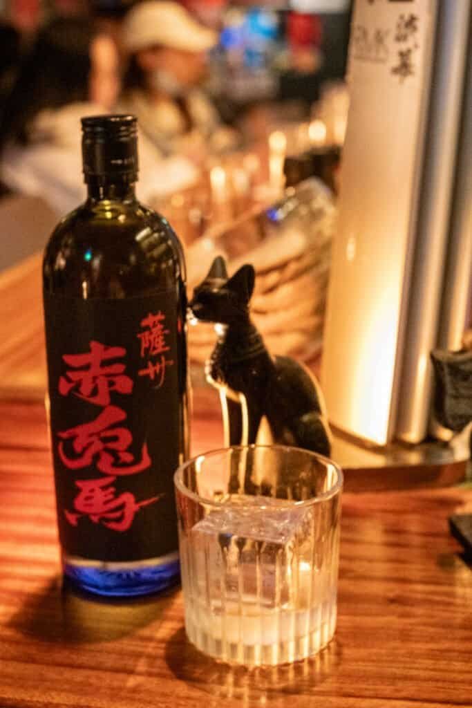 Low light photo taken in a bar A drink shouchu cat bar bokeh 7artisans f1.2 35mm Taken on Fujifilm x-t30
