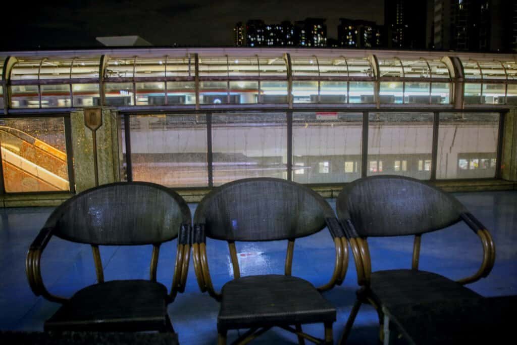 Low light chairs on with Shenzhen subway in background Shenzhen china taken on the canon d6 mark 1