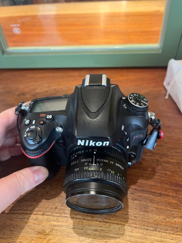 The Nikon d600 overhead in hand
