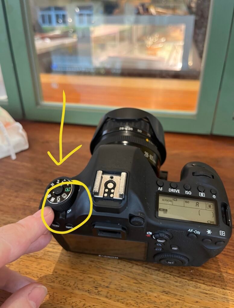Canon 6d mark1 on off top button view on table top