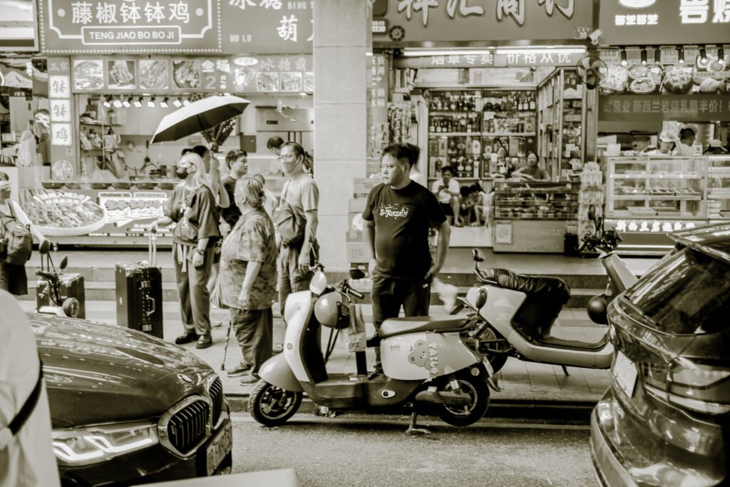 A busy street seen in dongmen shenzhen china black and white canon d6 mark I