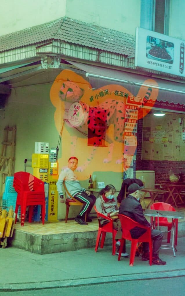 Reflection street chengdu Window street life Reflection street chengdu people walking siting china road buildings