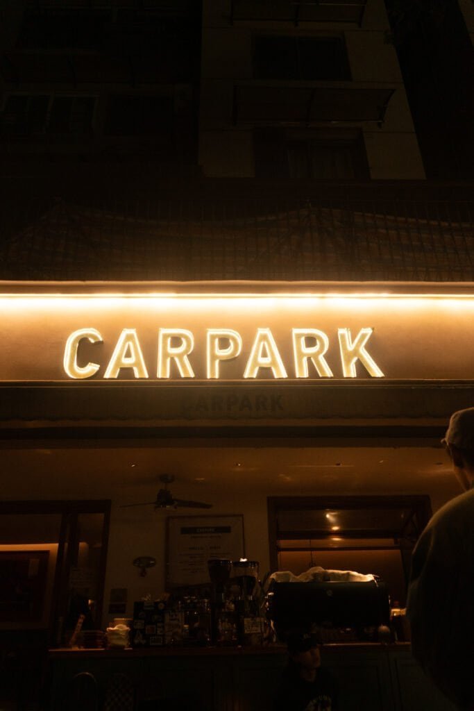 Early evening Chengdu coffee shop carpark sign people street coffee shop china sichuan song a6300