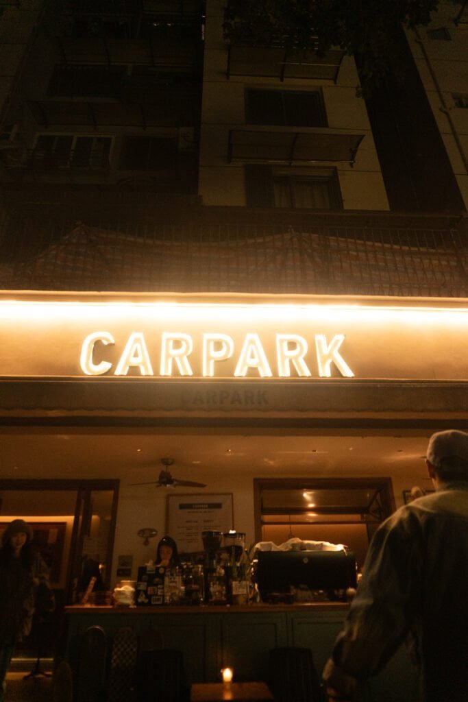 Early evening Chengdu coffee shop carpark sign people street coffee shop china sichuan song a6300